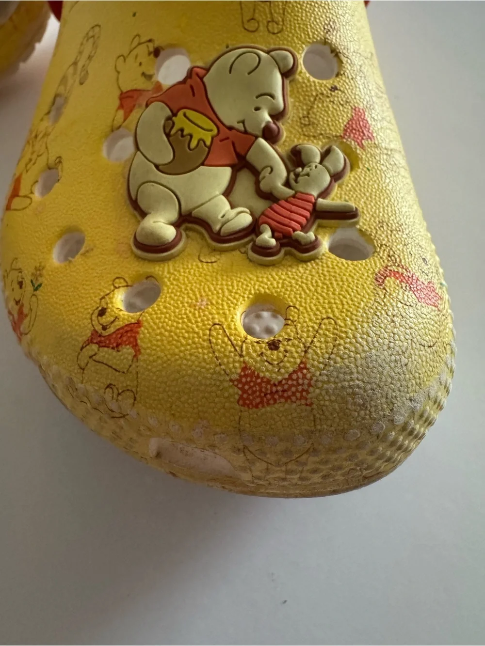CROCS Kids Yellow Clogs with Red Heel Straps - Winnie the Pooh Theme